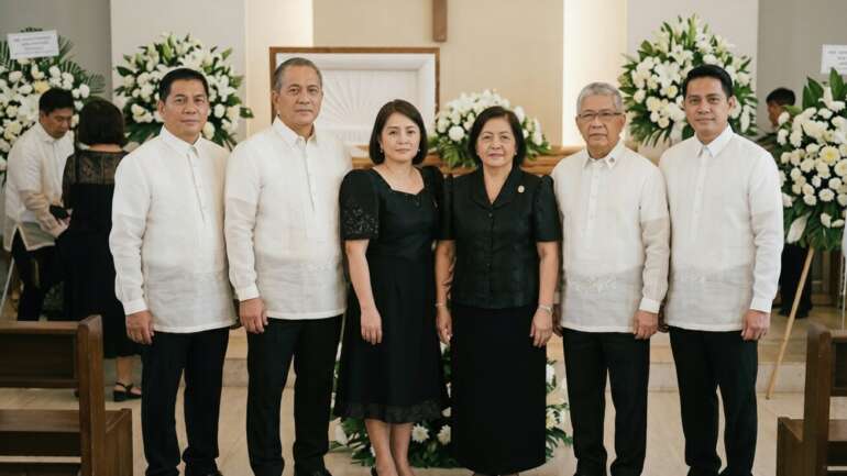 Group in traditional mourning attire
