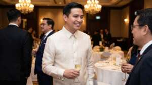 Man Wearing Barong at Dinner Party