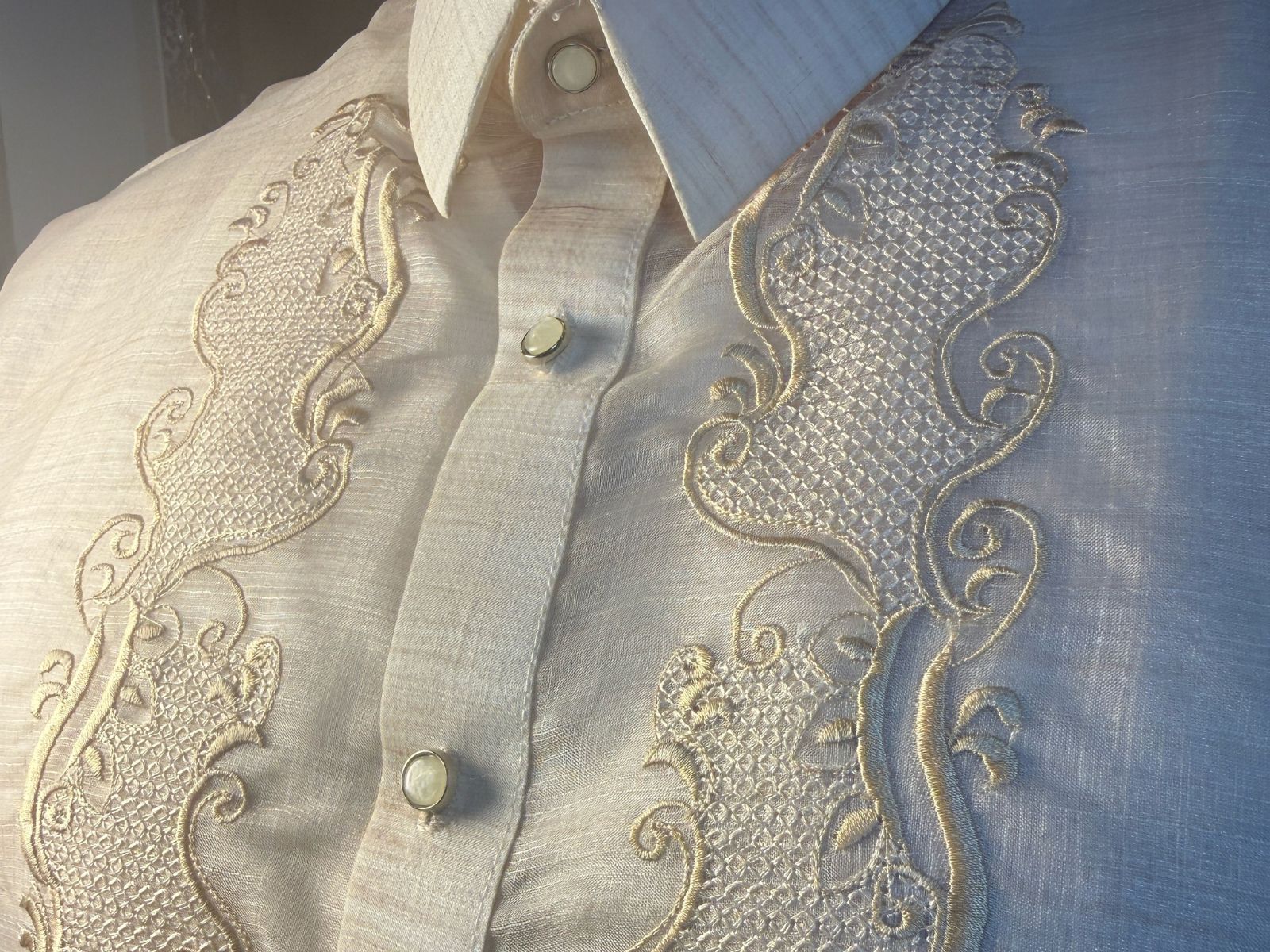 Close-up of handwoven cocoon silk fabric showing its quiet luster and weight