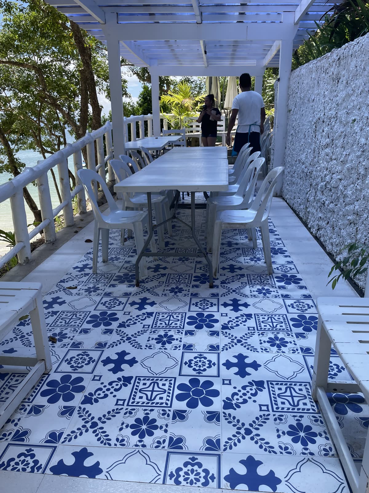 Blue-and-white tiled walkway at a Philippine resort